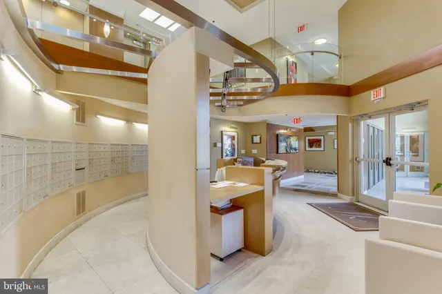 a view of a hallway with dining area