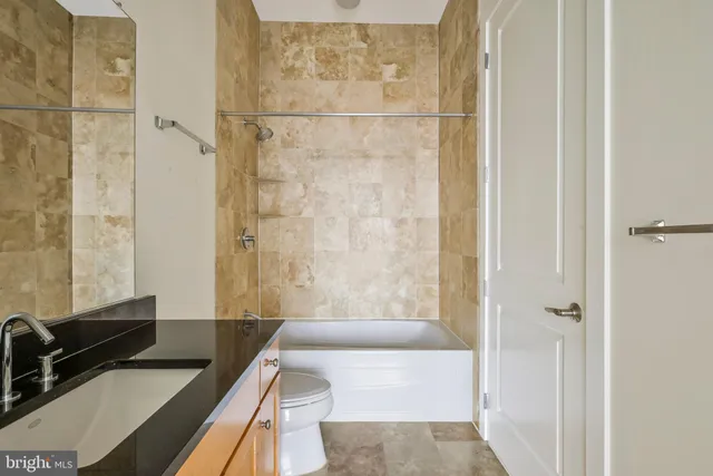 a bathroom with a sink and a shower