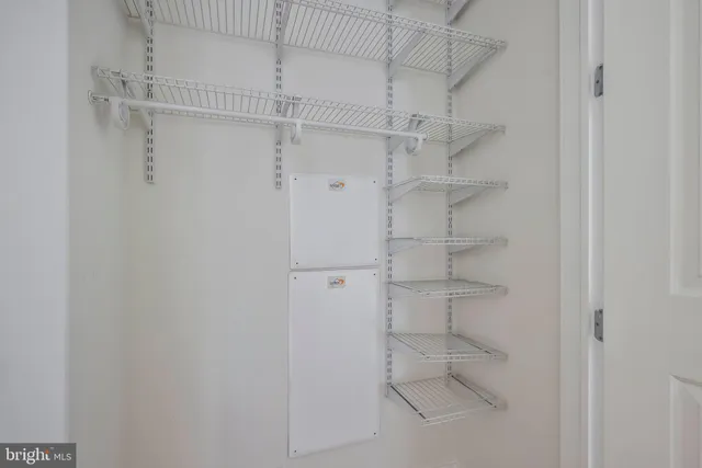 a view of a room with racks on the wall