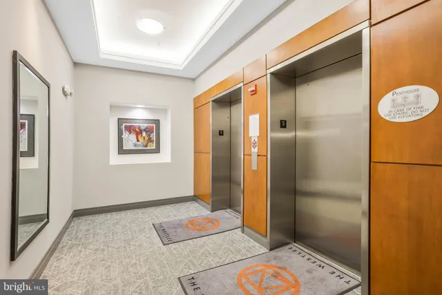 a view of room with bathroom and a window