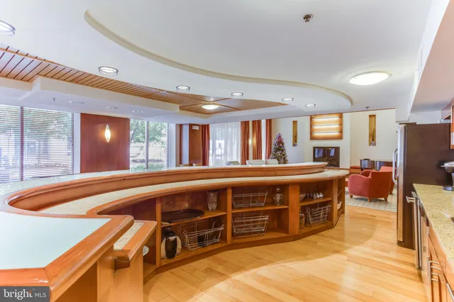 a spacious bathroom with a large tub and sink