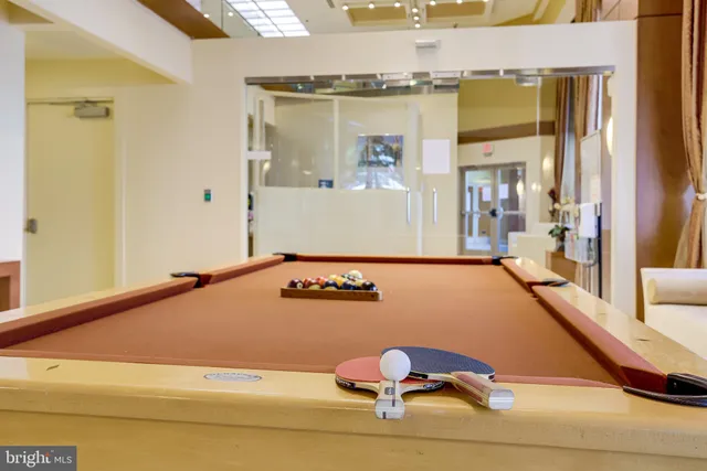 a room with furniture and view of living room