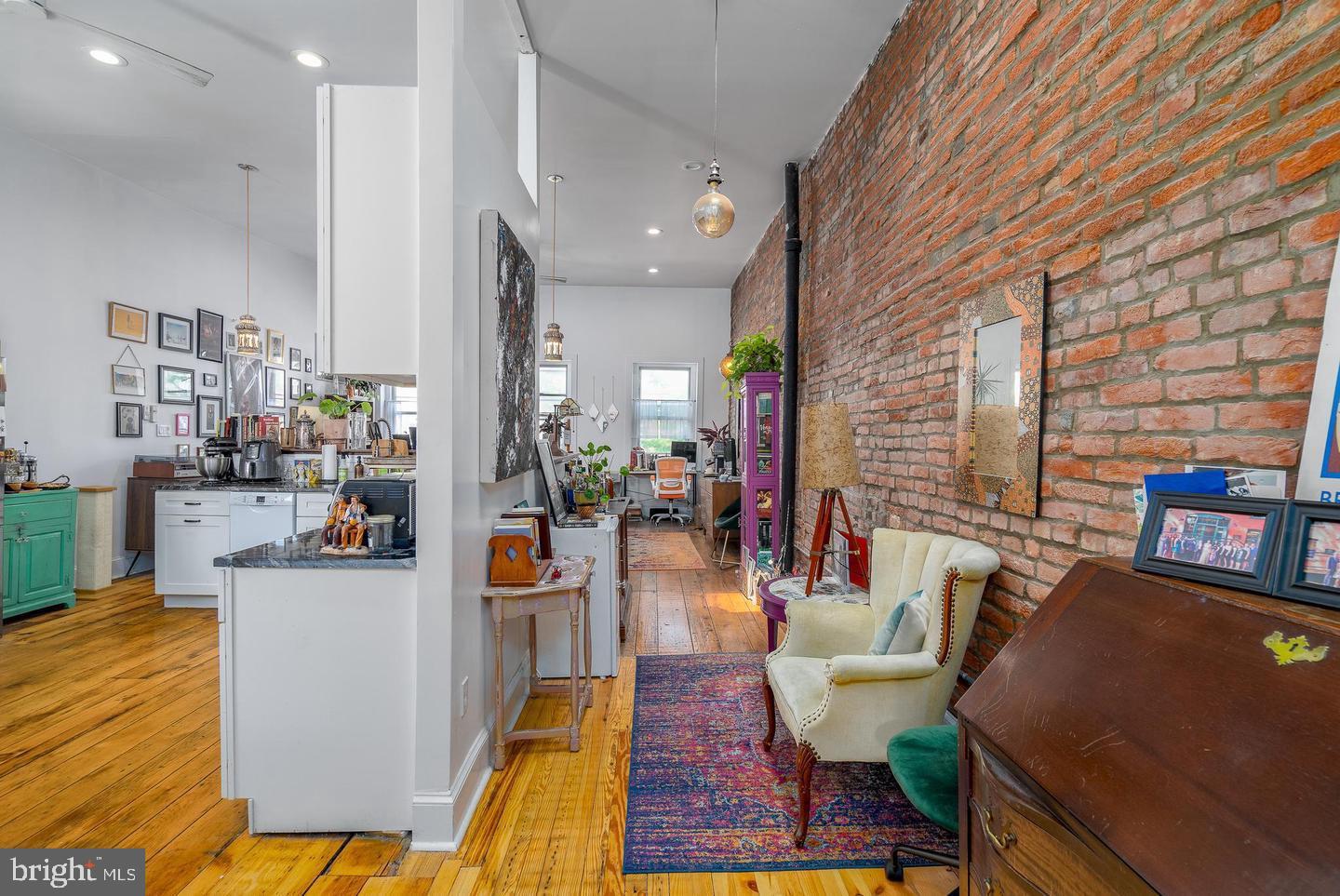 519 South 5th Street Philadelphia, PA 19147 - Photo 12 of 17 a living room with furniture and a table