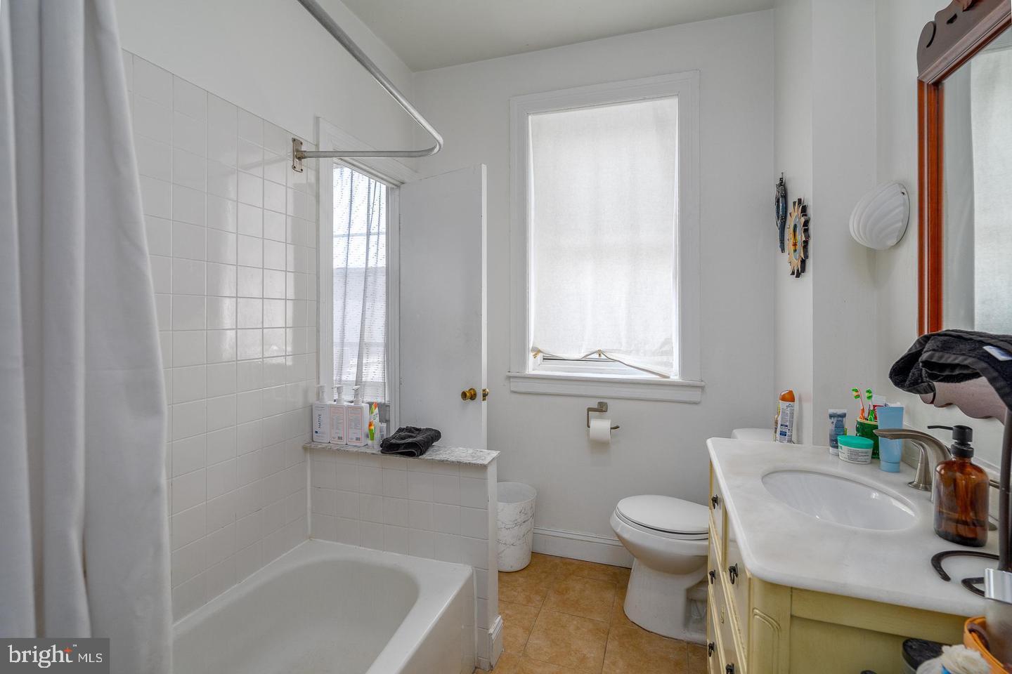 519 South 5th Street Philadelphia, PA 19147 - Photo 16 of 17 a bathroom with a sink toilet and shower