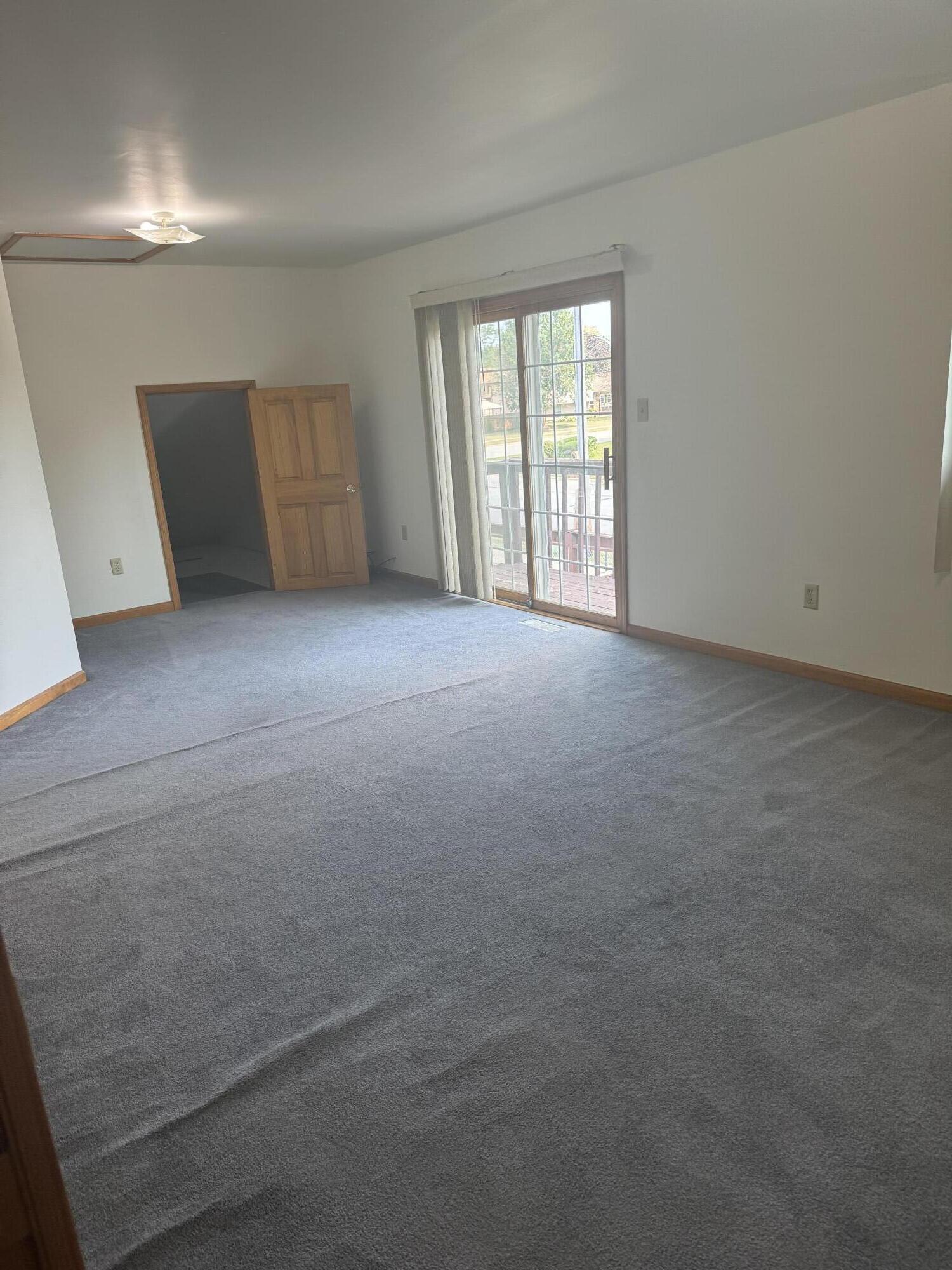 9871 Grant Place Crown Point, IN 46307 - Photo 13 of 18 an empty room with windows