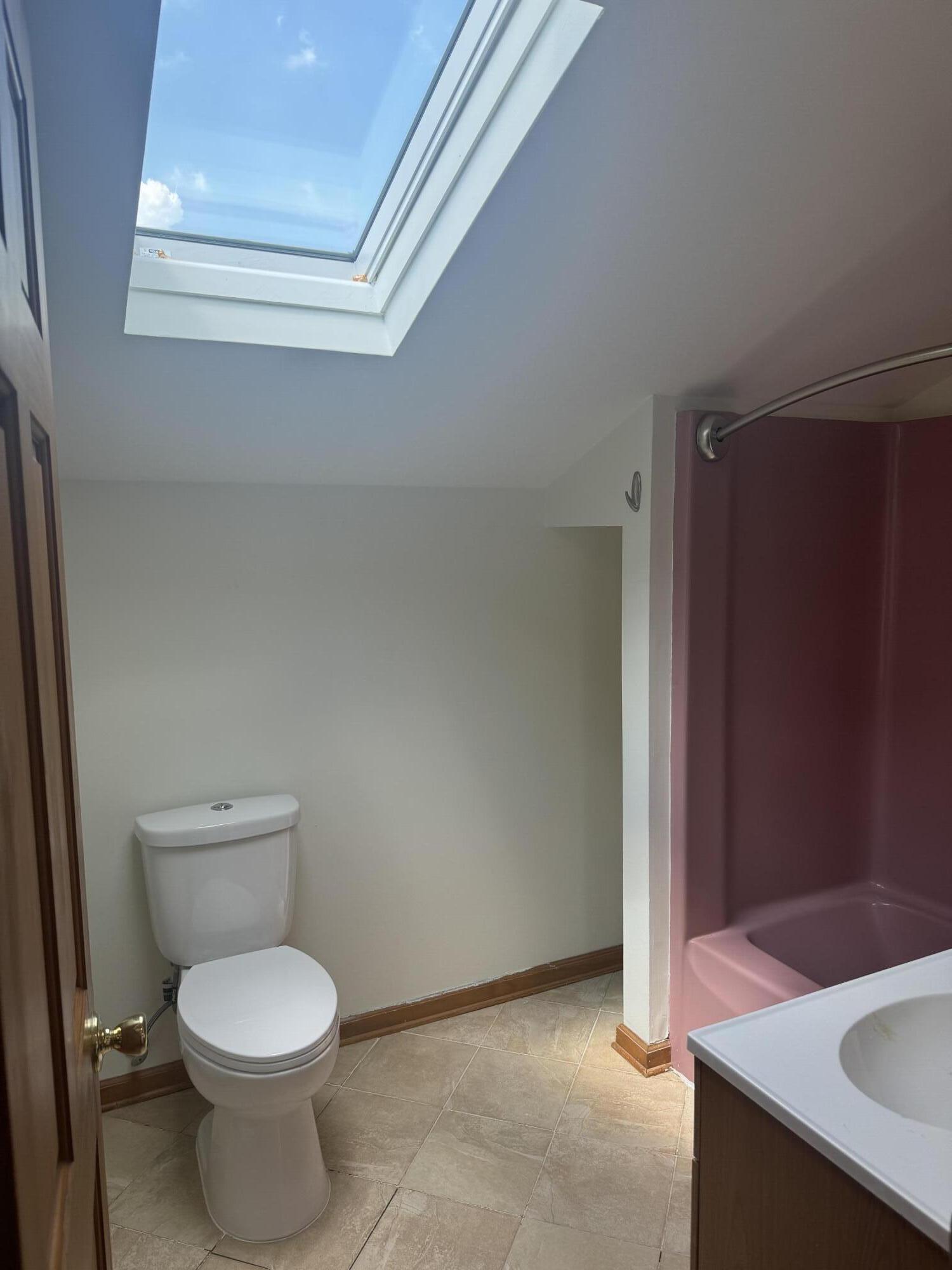 9871 Grant Place Crown Point, IN 46307 - Photo 14 of 18 a bathroom with a granite countertop toilet and a sink