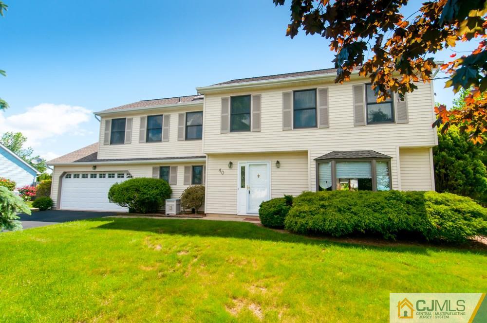 40 Higgins Road Old Bridge, NJ 08857 - Photo 1 of 46 a front view of a house with a yard