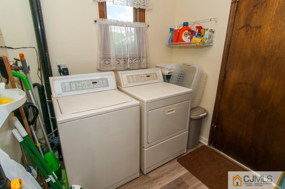 40 Higgins Road Old Bridge, NJ 08857 - Photo 19 of 46 a utility room with dryer and washer