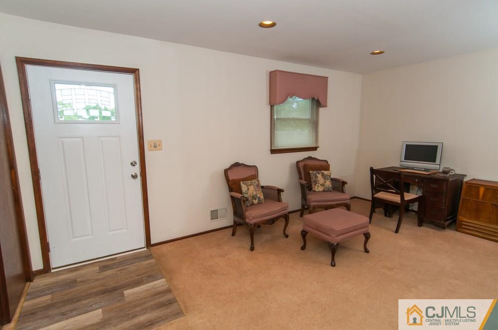 40 Higgins Road Old Bridge, NJ 08857 - Photo 20 of 46 a view of a workspace with furniture and a window