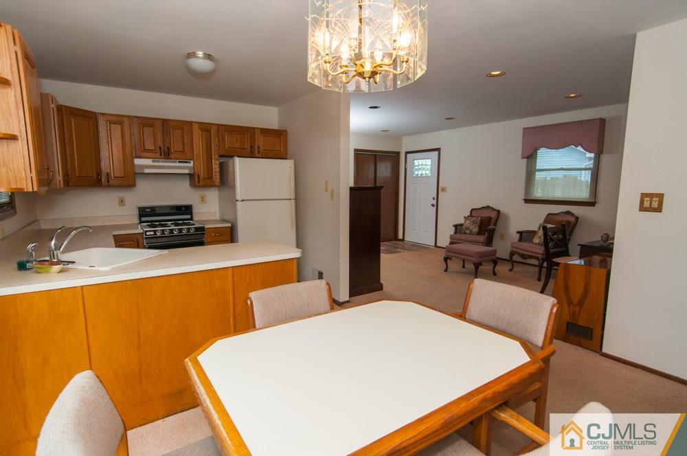 40 Higgins Road Old Bridge, NJ 08857 - Photo 24 of 46 a large white kitchen with a large window