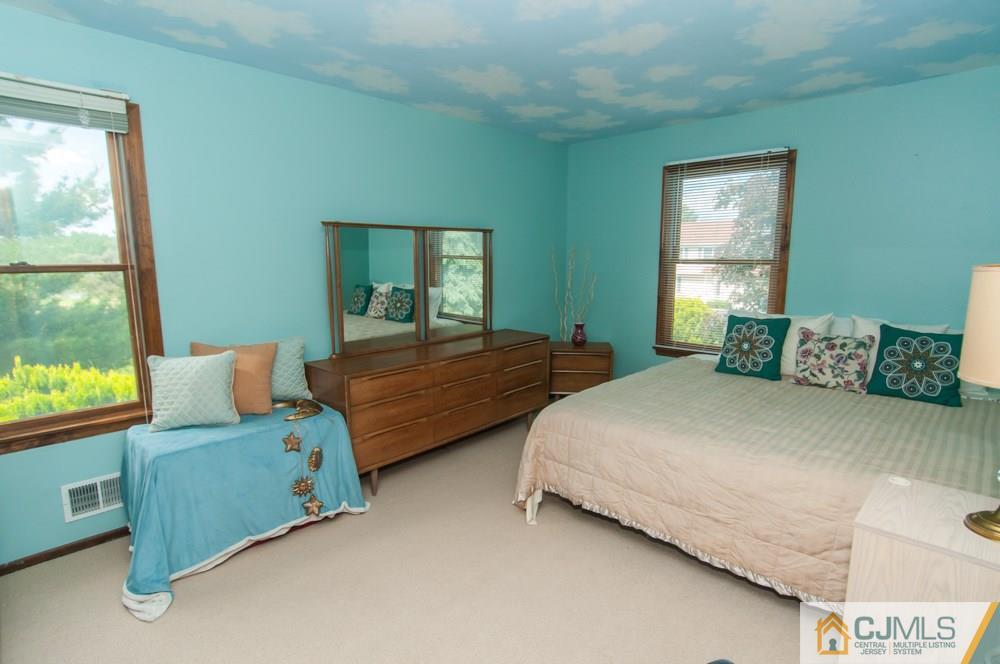 40 Higgins Road Old Bridge, NJ 08857 - Photo 31 of 46 a bedroom with two beds and large windows