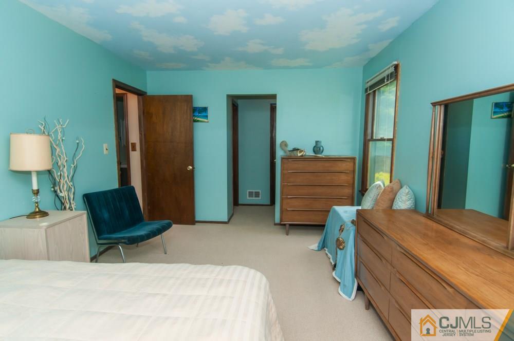 40 Higgins Road Old Bridge, NJ 08857 - Photo 32 of 46 a bedroom with a bed and furniture