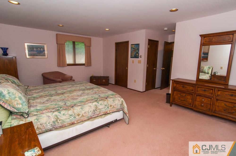 40 Higgins Road Old Bridge, NJ 08857 - Photo 36 of 46 a bedroom with a bed and dresser