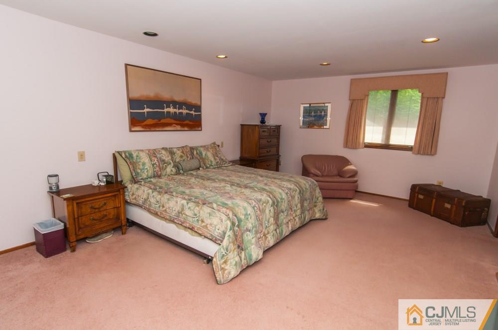 40 Higgins Road Old Bridge, NJ 08857 - Photo 37 of 46 a bedroom with a bed and dresser