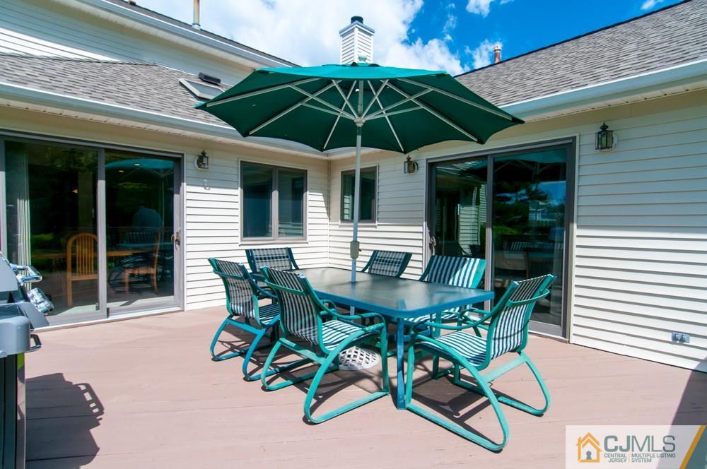 40 Higgins Road Old Bridge, NJ 08857 - Photo 42 of 46 a patio with a table and chairs