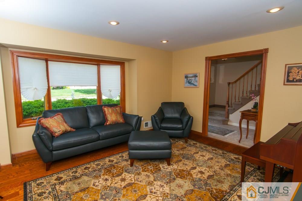 40 Higgins Road Old Bridge, NJ 08857 - Photo 6 of 46 a living room with furniture and a window
