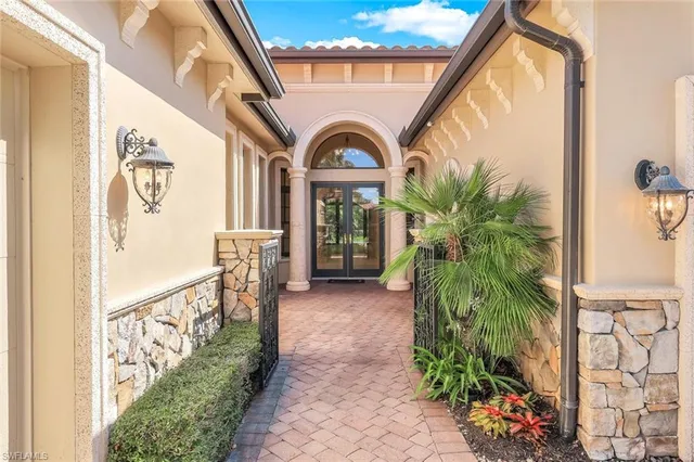 wooden floor in a hall with a window