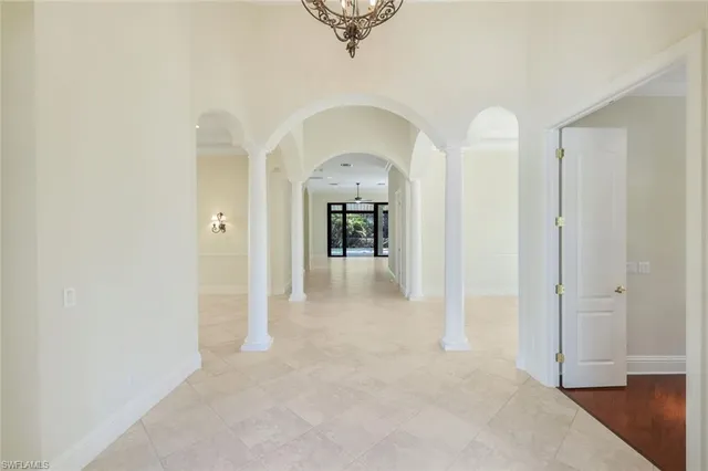 a kitchen with stainless steel appliances granite countertop a sink and a microwave