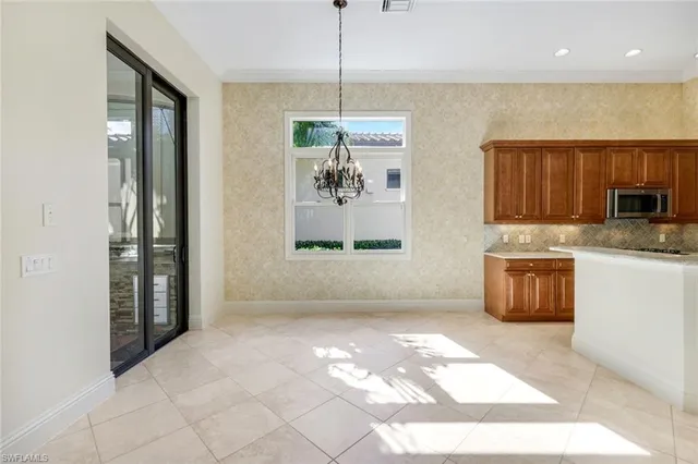 a bedroom with bed and a couch