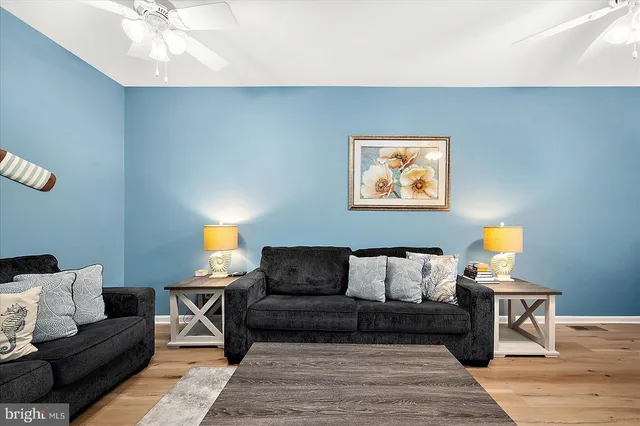 a room with furniture and wooden floor