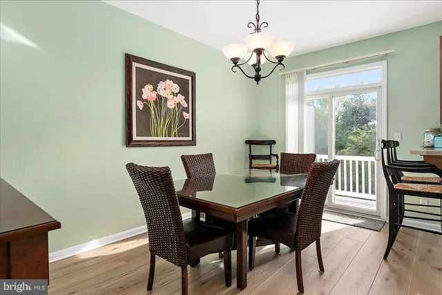 a bedroom with a large bed and a large window