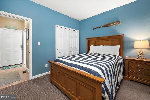 a view of a balcony with lake view and a floor to ceiling window