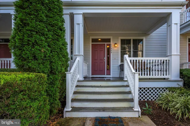 a view of entryway with stairs and wooden floor