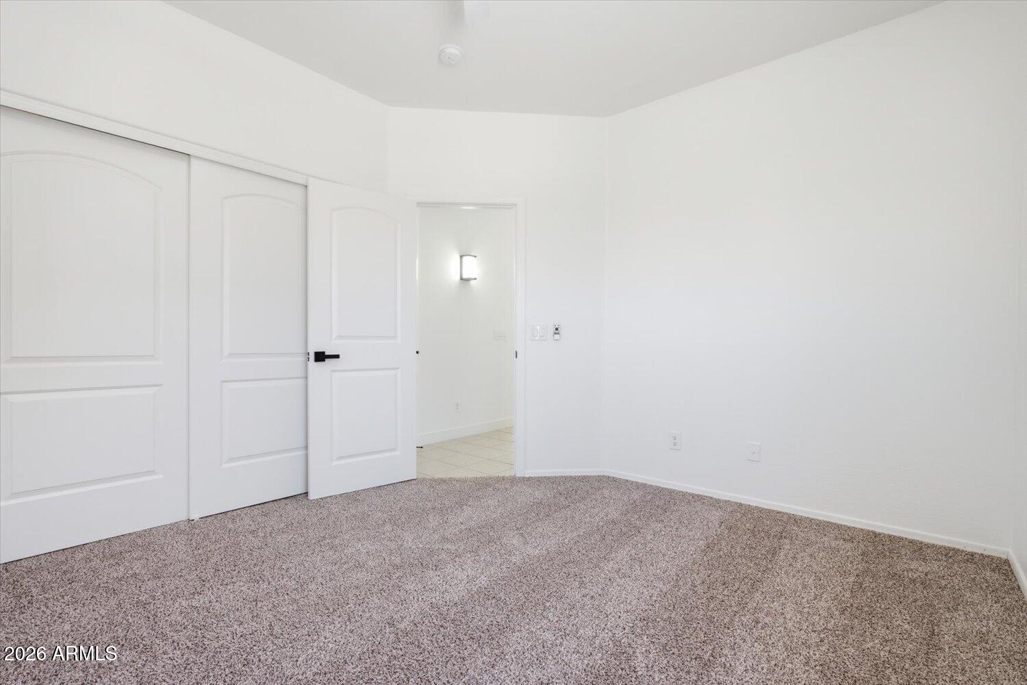 2565 South Signal Butte Road, Unit 23 Mesa, AZ 85209 - Photo 20 of 29 a view of an empty room