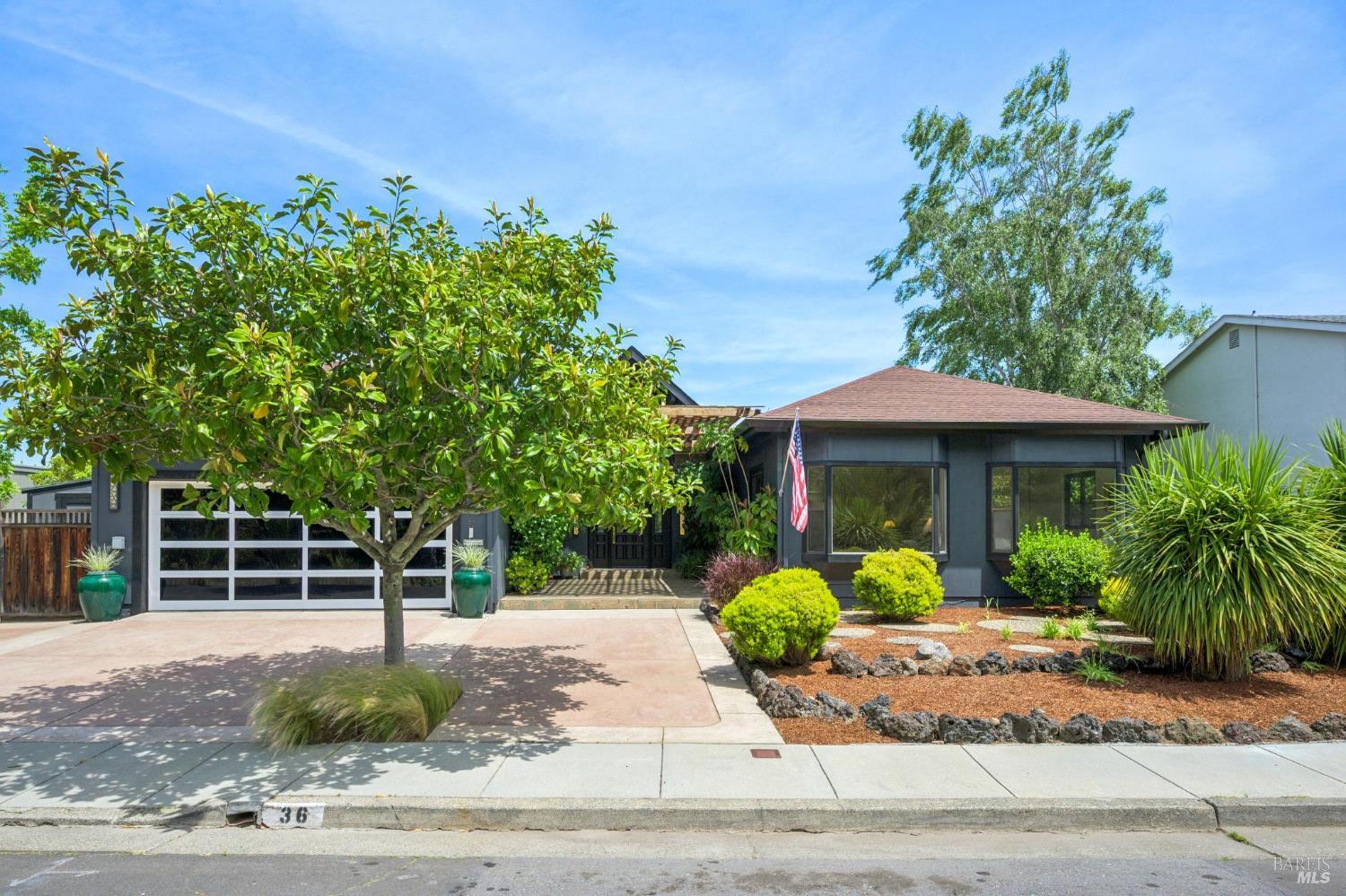 36 Main Drive San Rafael, CA 94901 - Photo 1 of 1 a front view of a house with garden