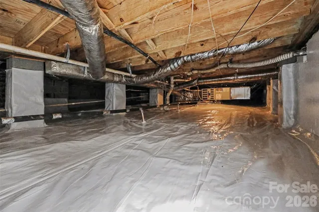 a view of a garage with wooden wall