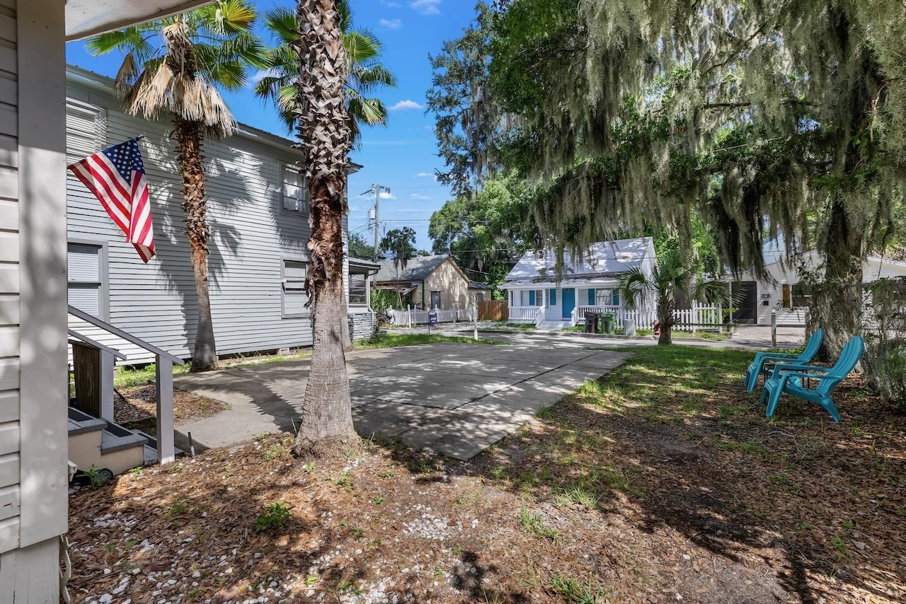 118 Pomar Street St. Augustine, FL 32084 - Photo 3 of 23 a backyard of a house with lots of green space