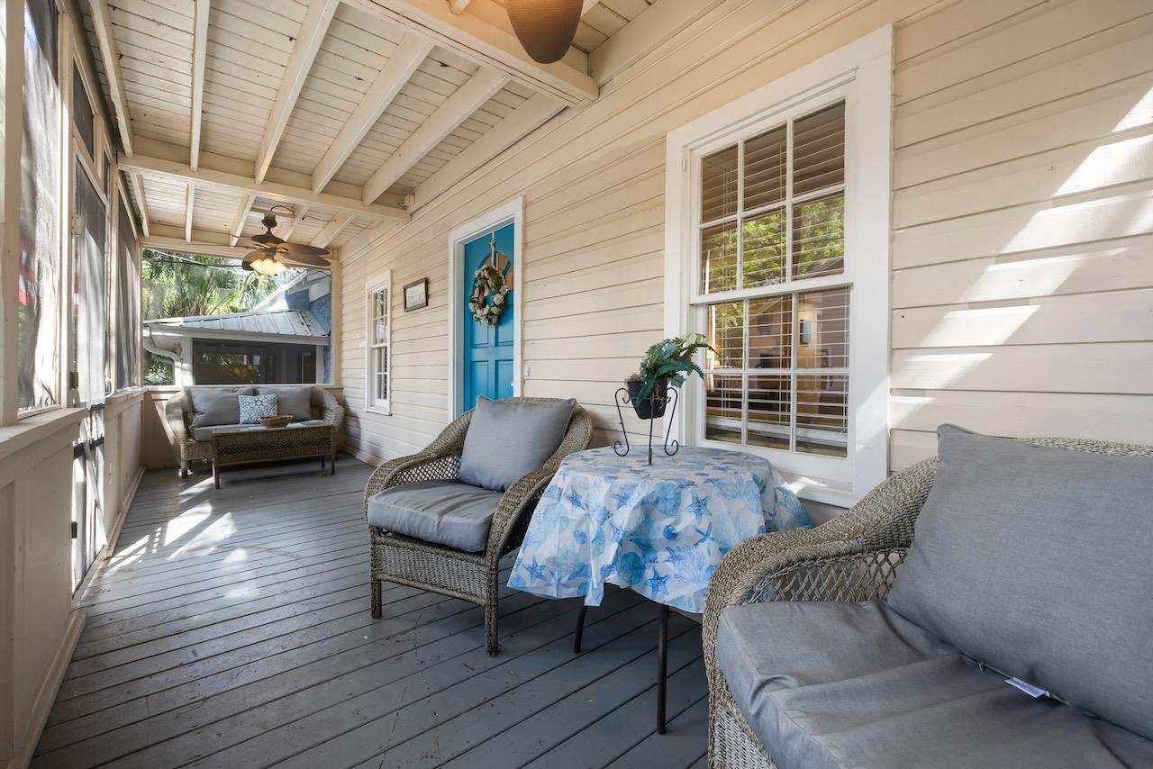 118 Pomar Street St. Augustine, FL 32084 - Photo 6 of 23 a outdoor living space with furniture and a potted plant