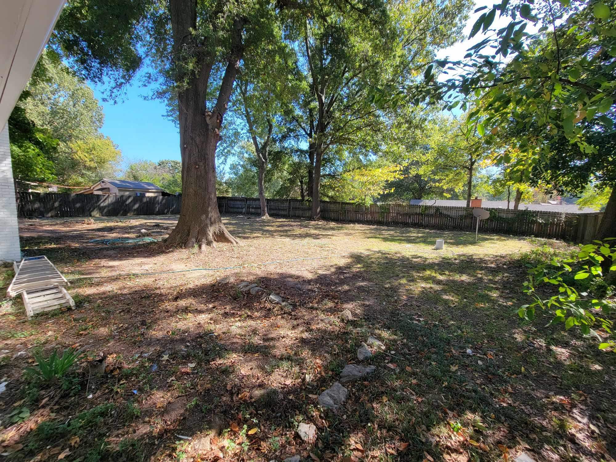 5231 Yellowood Road Memphis, TN 38134 - Photo 35 of 37 a view of a yard with plants and trees