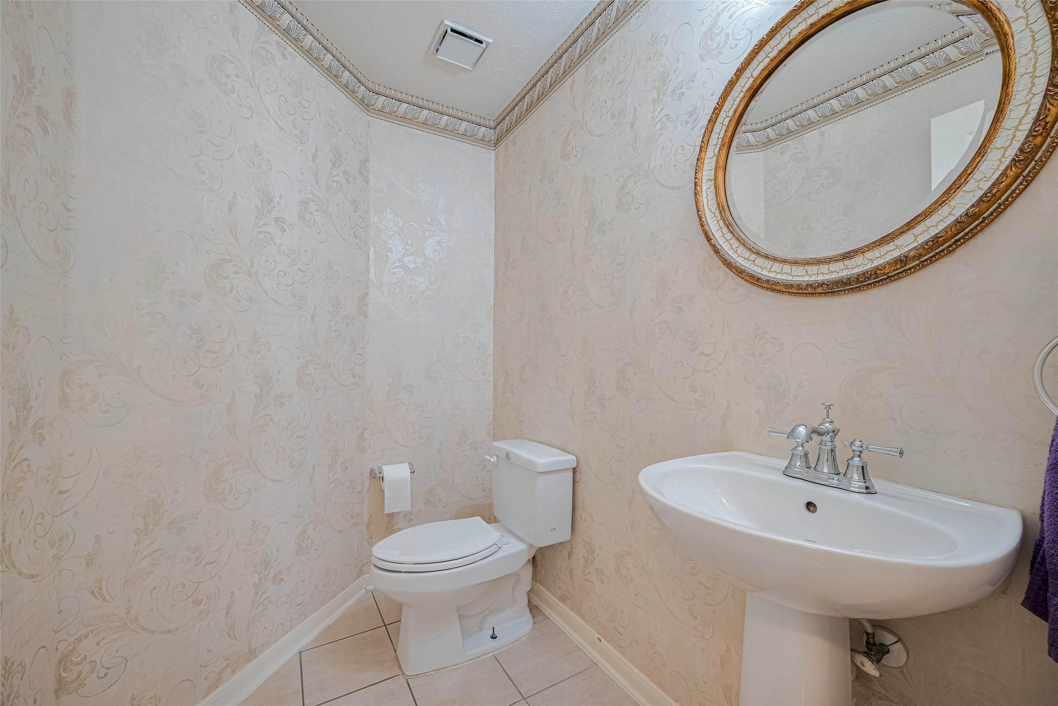 9218 Memorial Pines Way Spring, TX 77379 - Photo 20 of 39 The guest powder room is just outside the office/study