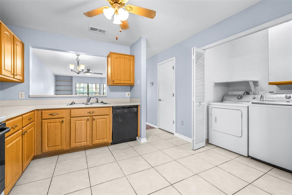 5100 Burchette Road, Unit 4102 Tampa, FL 33647 - Photo 14 of 47 a kitchen with a sink cabinets and window