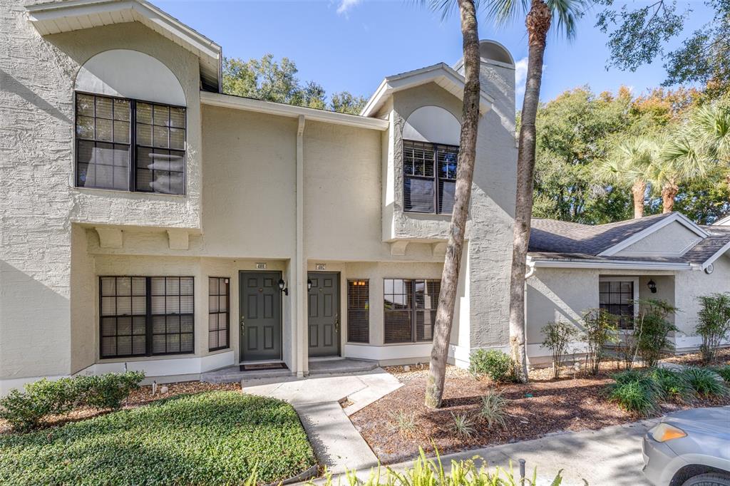 5100 Burchette Road, Unit 4102 Tampa, FL 33647 - Photo 2 of 47 front view of a house with a yard