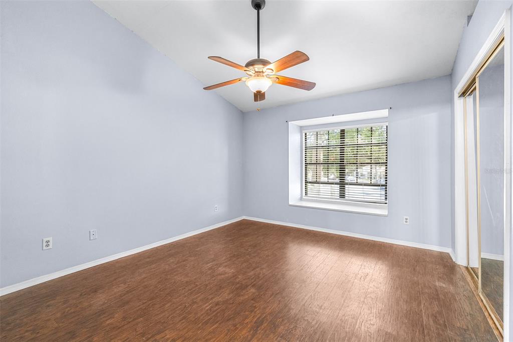 5100 Burchette Road, Unit 4102 Tampa, FL 33647 - Photo 25 of 47 wooden floor in an empty room with a window