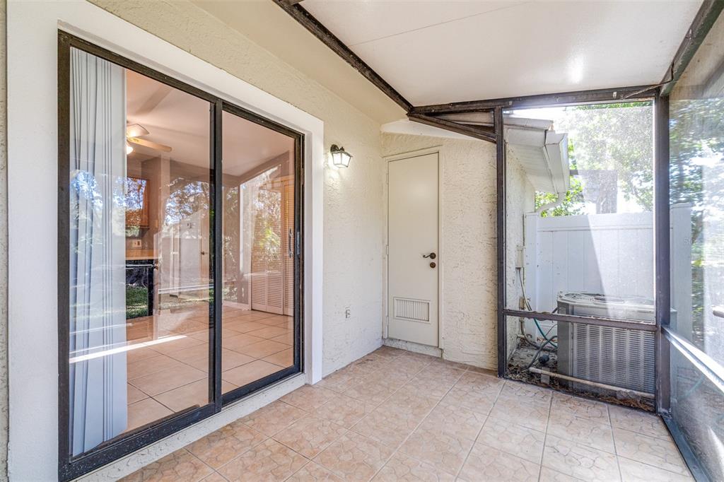 5100 Burchette Road, Unit 4102 Tampa, FL 33647 - Photo 32 of 47 a view of an entryway with a glass door