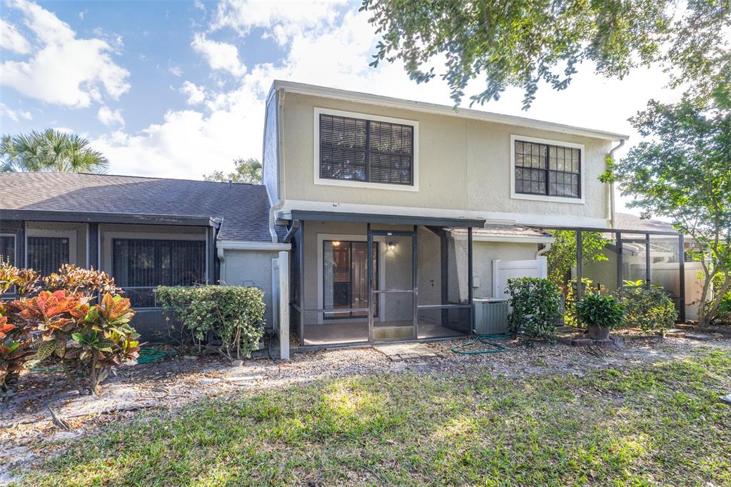 5100 Burchette Road, Unit 4102 Tampa, FL 33647 - Photo 33 of 47 a front view of a house with garden