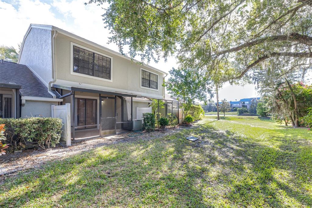 5100 Burchette Road, Unit 4102 Tampa, FL 33647 - Photo 34 of 47 a view of a house with a yard and sitting area