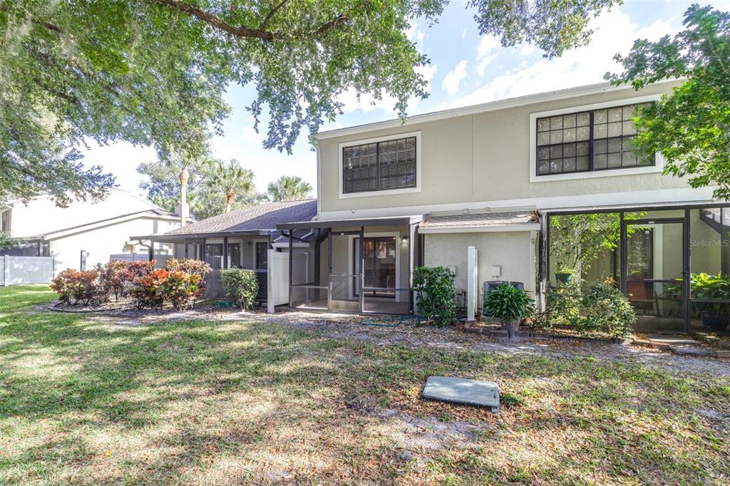 5100 Burchette Road, Unit 4102 Tampa, FL 33647 - Photo 35 of 47 a front view of a house with garden