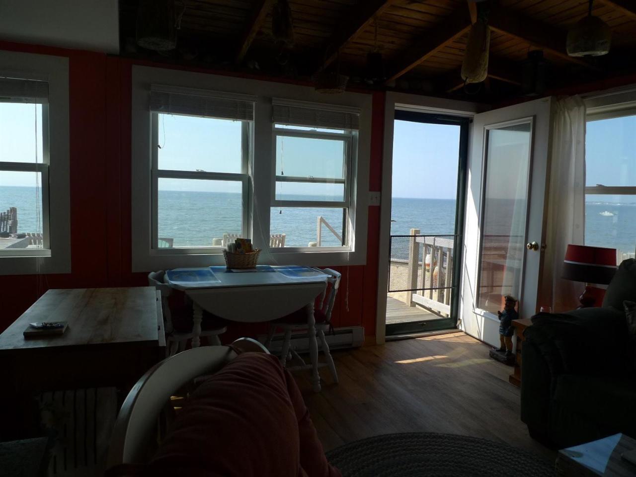 522 Shore Road, Unit 4 Truro, MA 02666 - Photo 2 of 12 a living room with furniture and a window