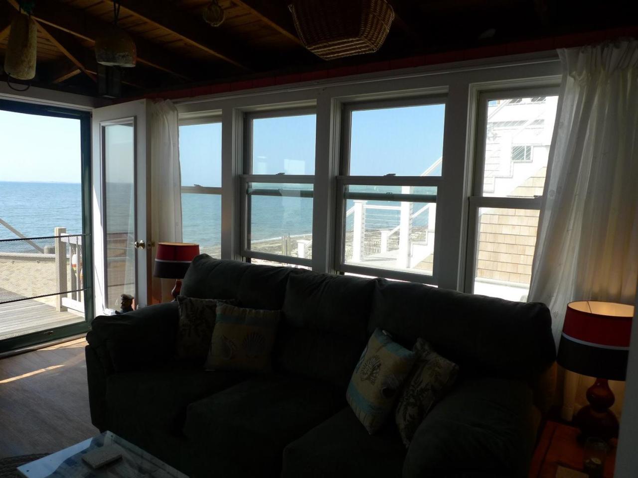 522 Shore Road, Unit 4 Truro, MA 02666 - Photo 4 of 12 a living room with furniture and a window