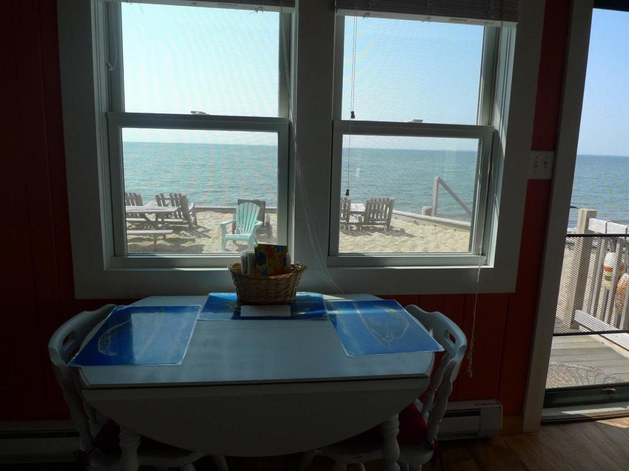 522 Shore Road, Unit 4 Truro, MA 02666 - Photo 6 of 12 a dining room with a table and chairs