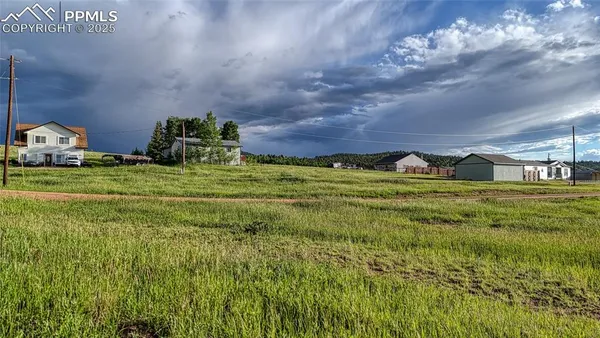 a view of a golf course with a lake