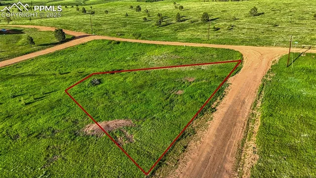 a view of a lake with a yard