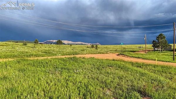 a view of a lake with a big yard