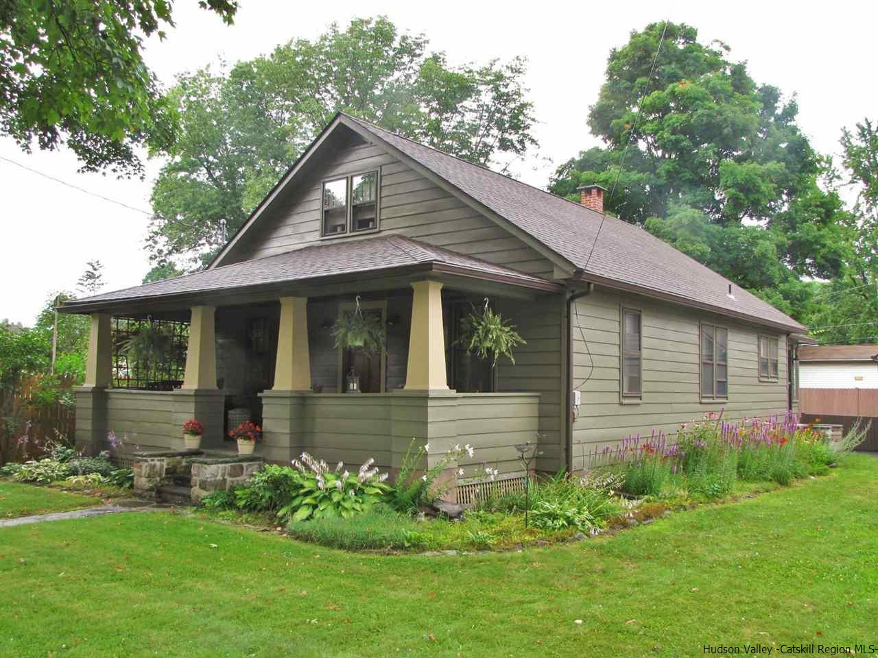 21 Crittenden Street Wallkill, NY 12589 - Photo 1 of 28 a front view of a house with a garden