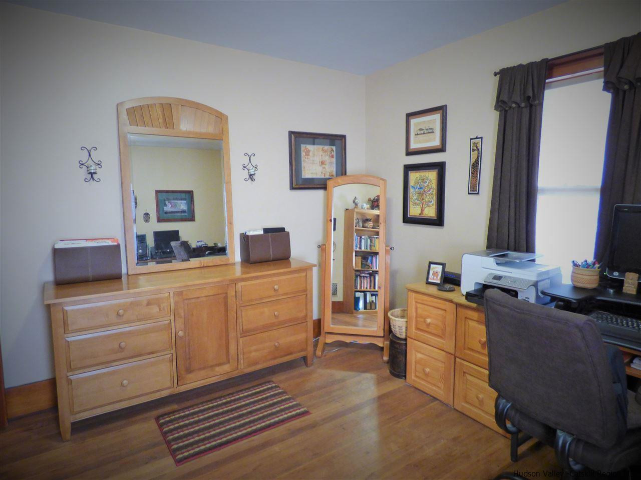 21 Crittenden Street Wallkill, NY 12589 - Photo 18 of 28 a room with furniture a desk and chair