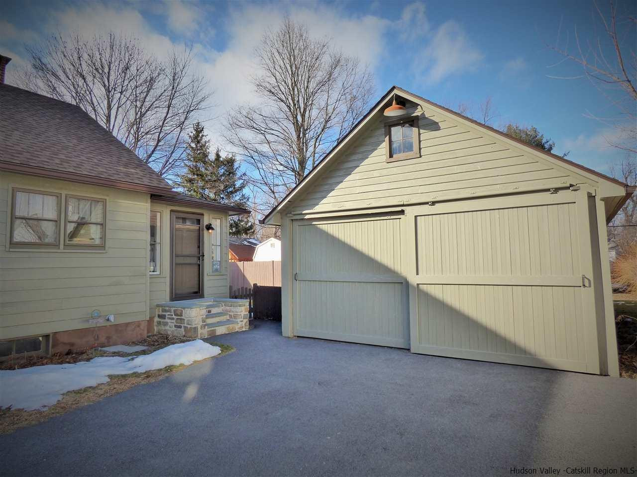 21 Crittenden Street Wallkill, NY 12589 - Photo 25 of 28 a front view of a house with garage
